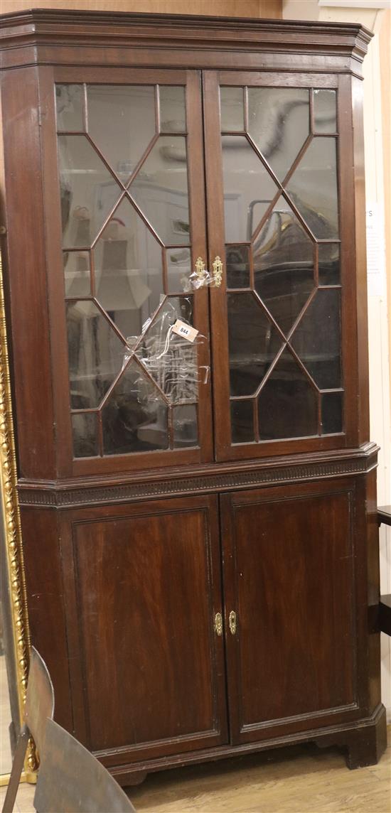 A George III design mahogany corner cupboard W.112cm